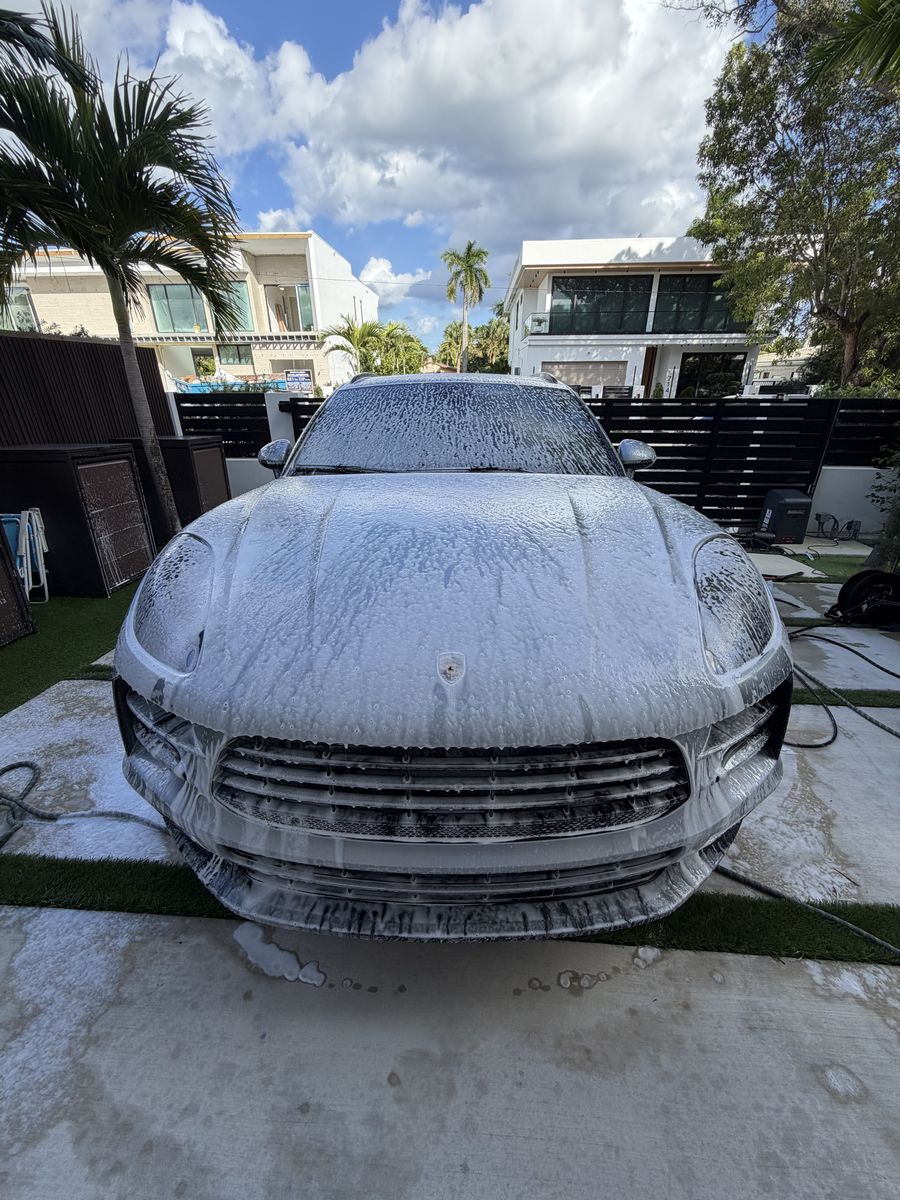 Porsche Macan covered in foam during the wash